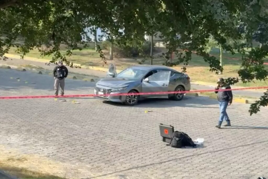 Carro agentes Harfuch