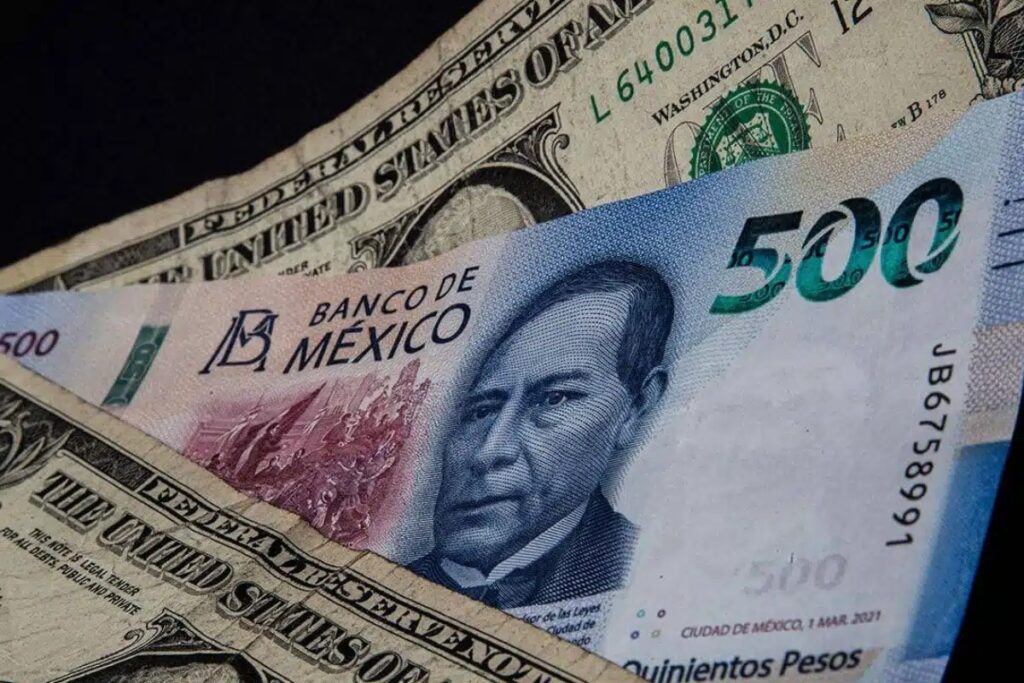 peso contra dólar